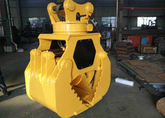Excavator rotating rock grapple (pengangkut batu berputar)