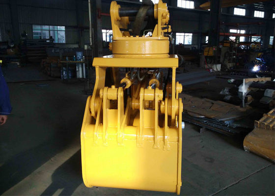 Excavator rotating rock grapple (pengangkut batu berputar)