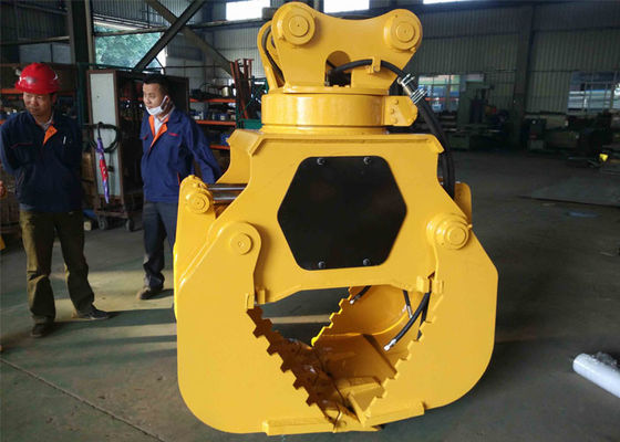 Excavator rotating rock grapple (pengangkut batu berputar)